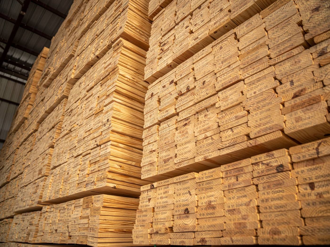 Bundles of sawn timber stacked at the yard